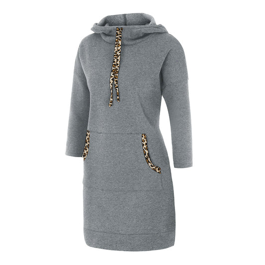 Woman wearing solid color cotton hooded sweatshirt with full hood