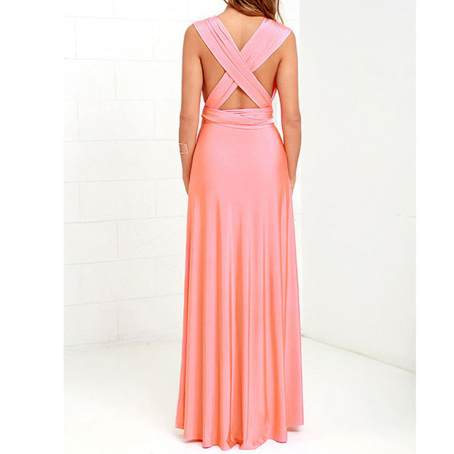Woman wearing sleeveless V-neck long dress with cross back