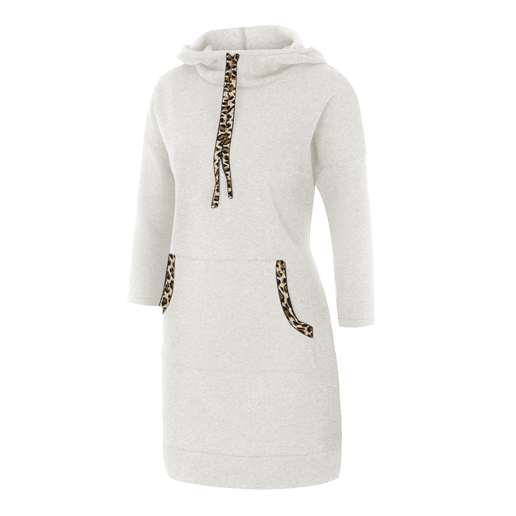 Woman wearing solid color cotton hooded sweatshirt with full hood