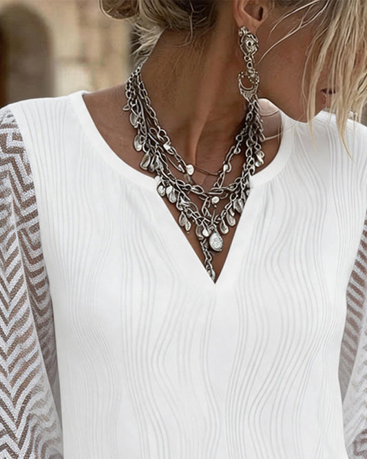 Women's V-neck lace sleeve blouse front view