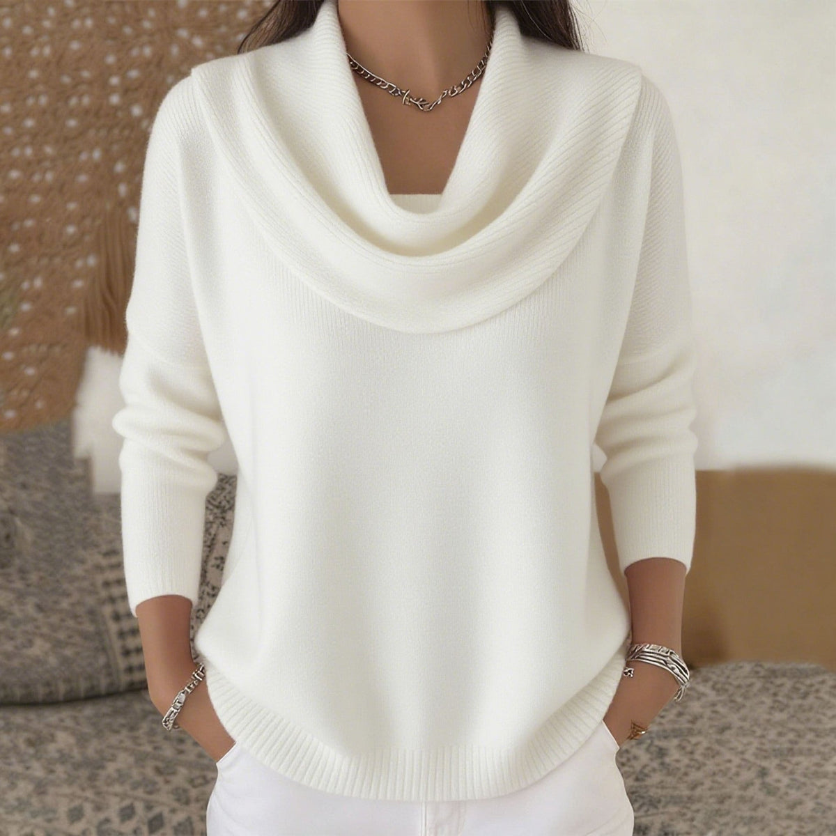Women's cowl neck knit sweater with long sleeves and relaxed fit