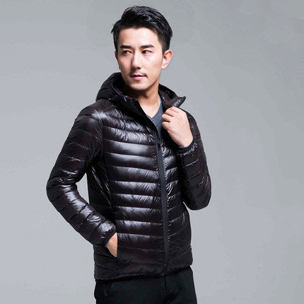 Men's packable puffer jacket - black hooded