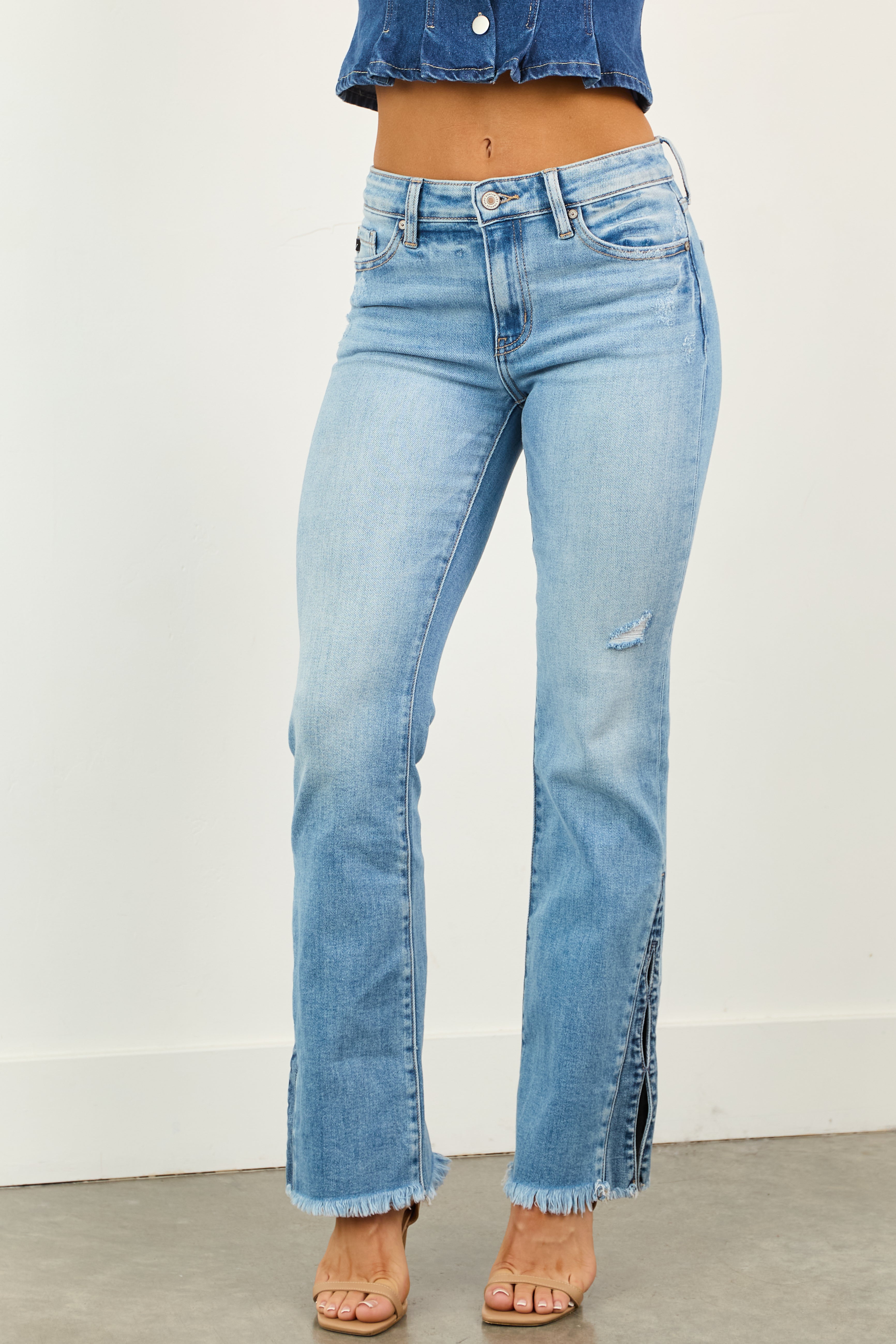 womens-flare-denim-jeans-with-split-hem-and-frayed-edge-5