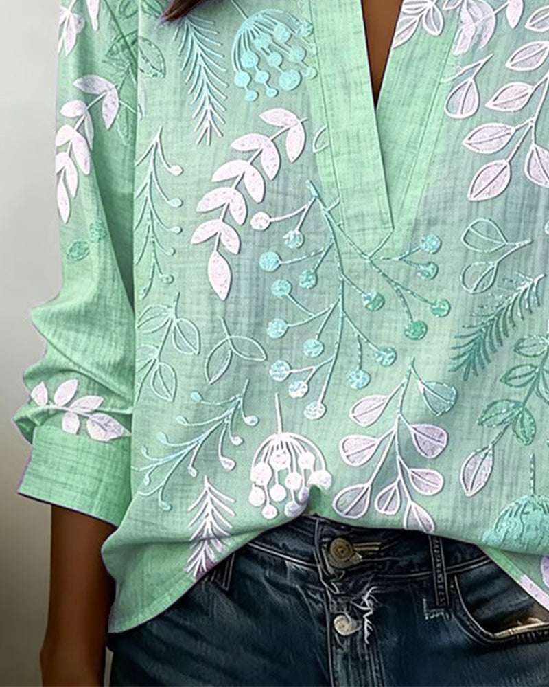 Women's draped V-neck floral blouse