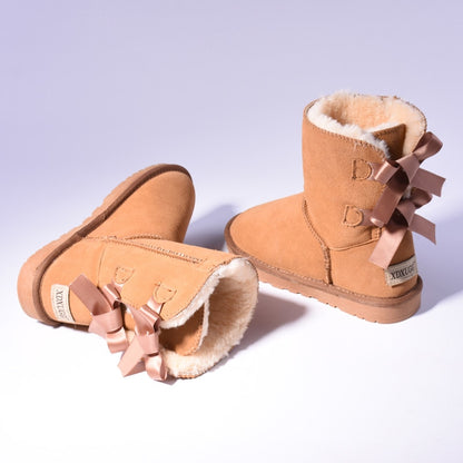 Women's mid-calf slip-on snow boots with bow detail