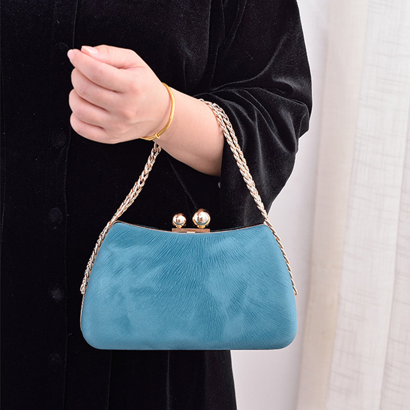Women's chain shoulder bag with embossed pillow shape
