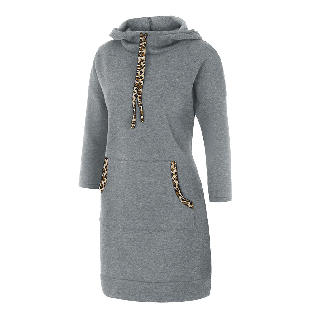 Woman wearing solid color cotton hooded sweatshirt with full hood