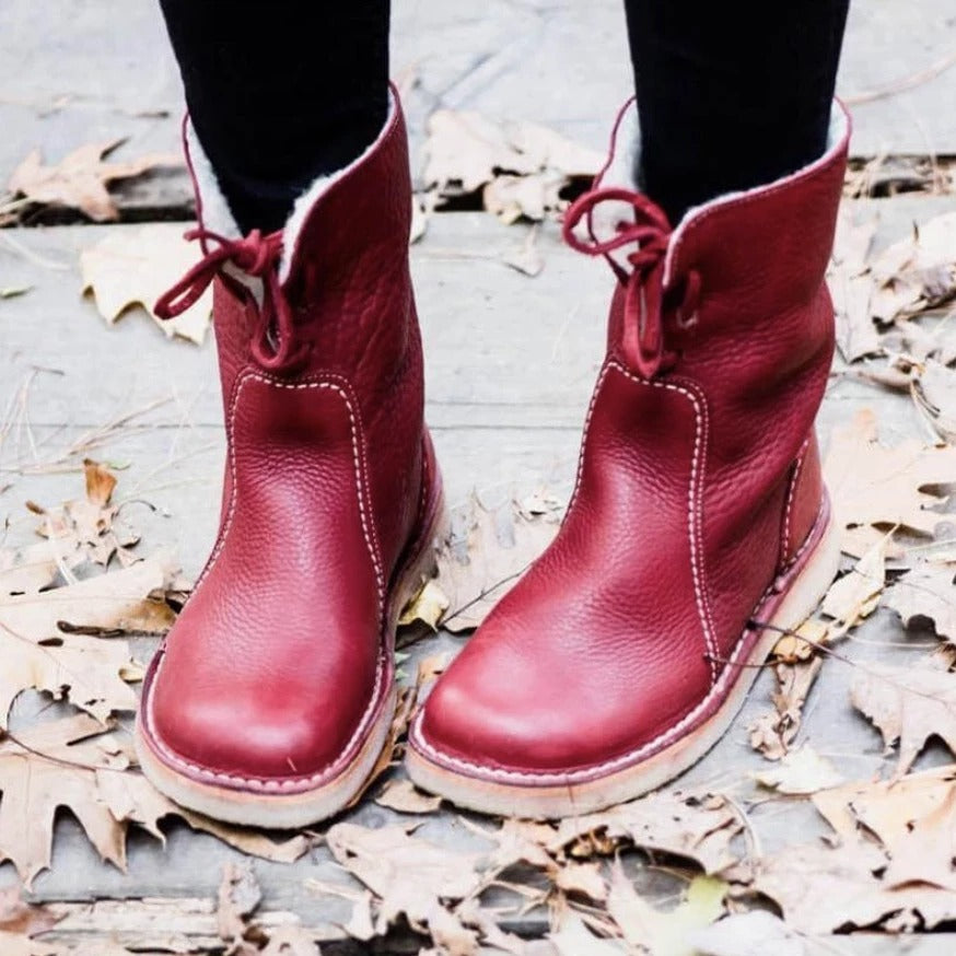 Women's winter snow boots with plush lining and lace-up front