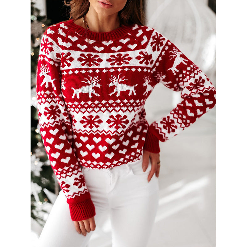 Women's red knit Christmas sweater with elk and snowflake pattern