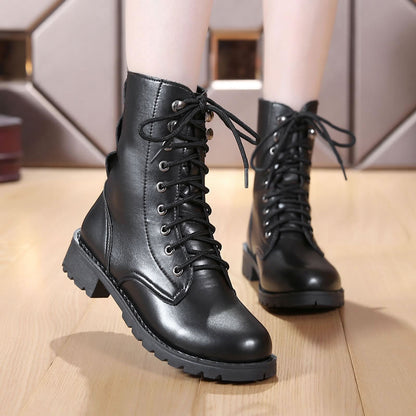 Black Martin boots with rivets and front tie