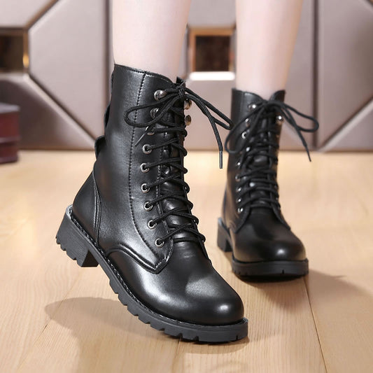 Black Martin boots with rivets and front tie