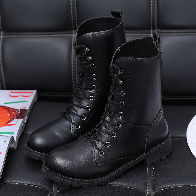 Black Martin boots with rivets and front tie