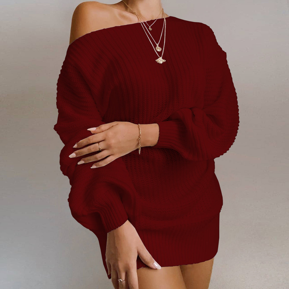 Woman wearing off-shoulder knit sweater dress with long sleeves