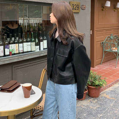 Women's short leather jacket with lapel collar in camel
