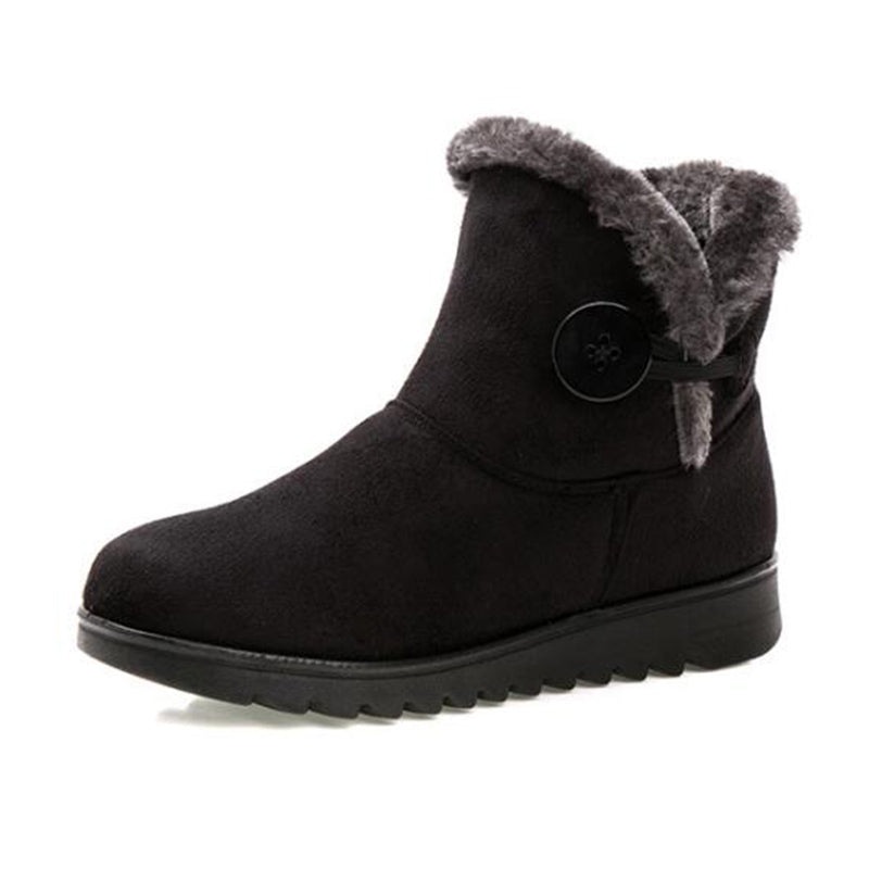 Women's ankle snow boots with platform sole and button closure