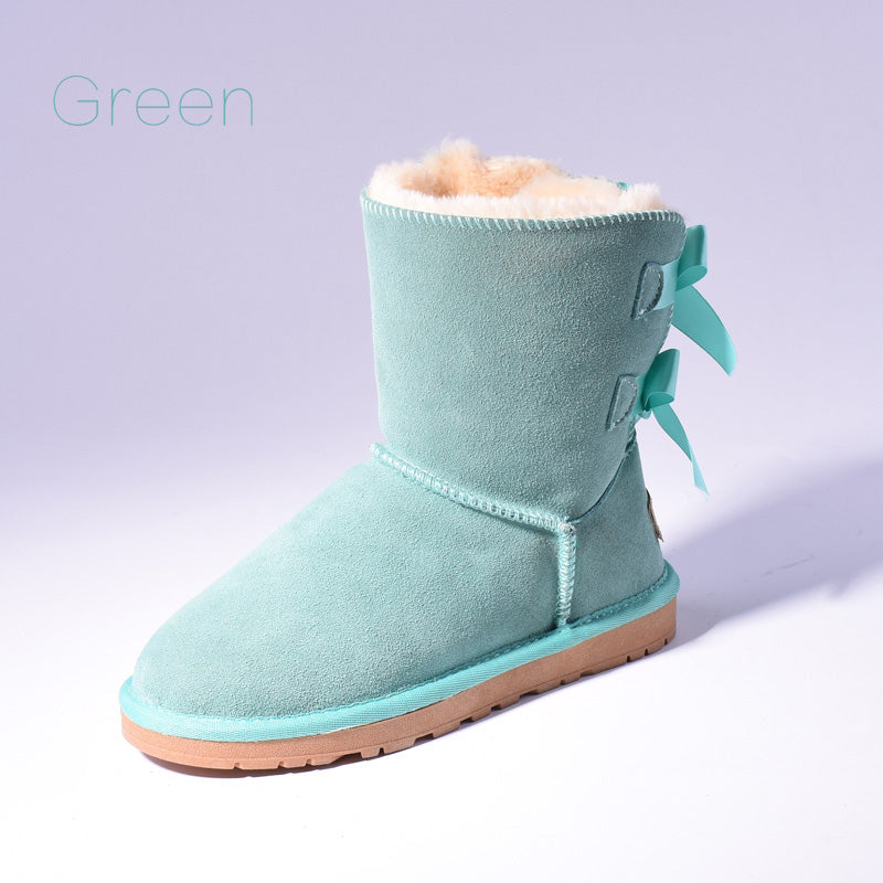 Women's mid-calf slip-on snow boots with bow detail