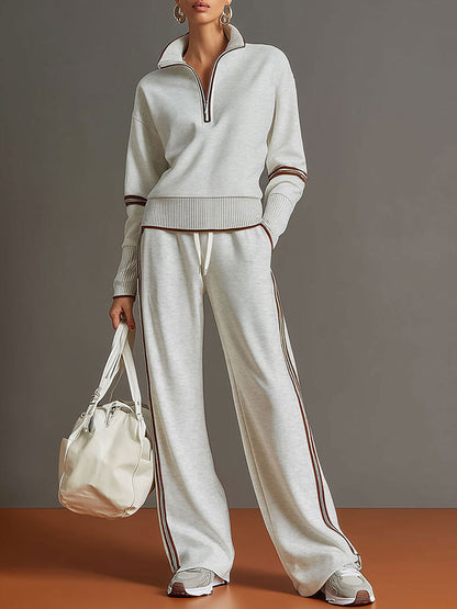 Woman wearing relaxed blouse and wide leg pants set