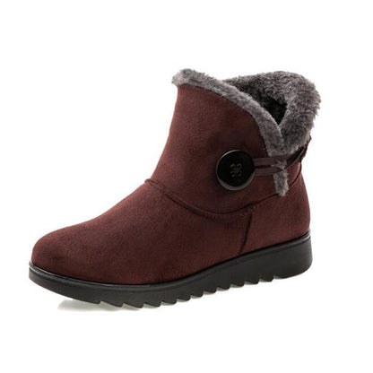 Women's ankle snow boots with platform sole and button closure