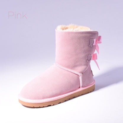 Women's mid-calf slip-on snow boots with bow detail