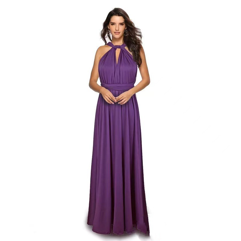 Woman wearing sleeveless V-neck long dress with cross back