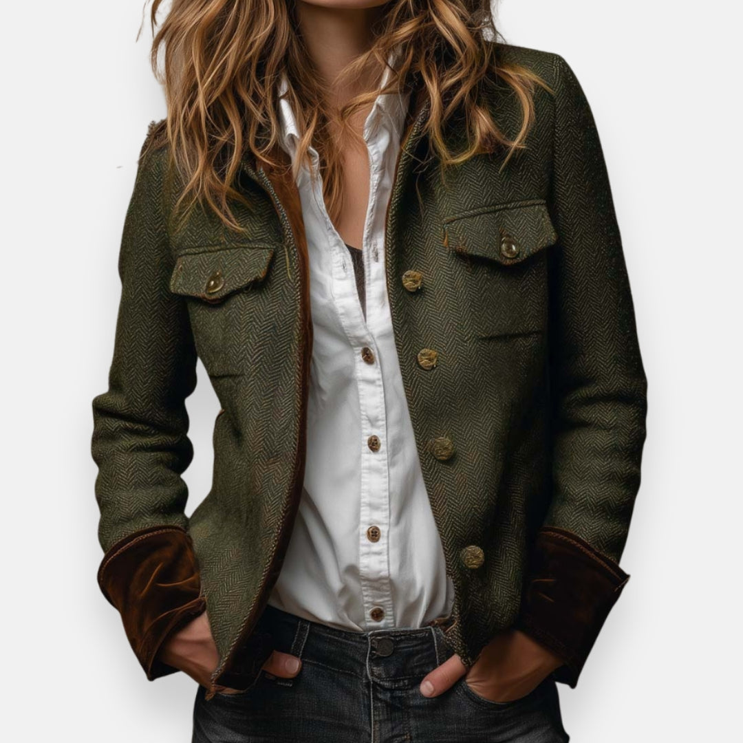 Woman wearing herringbone structured jacket with tailored fit