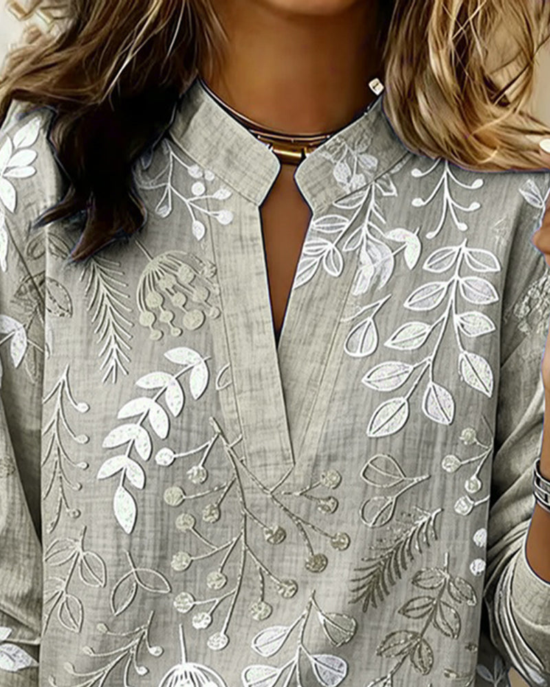 Women's draped V-neck floral blouse