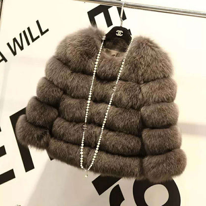 Woman wearing long faux fur winter coat outdoors