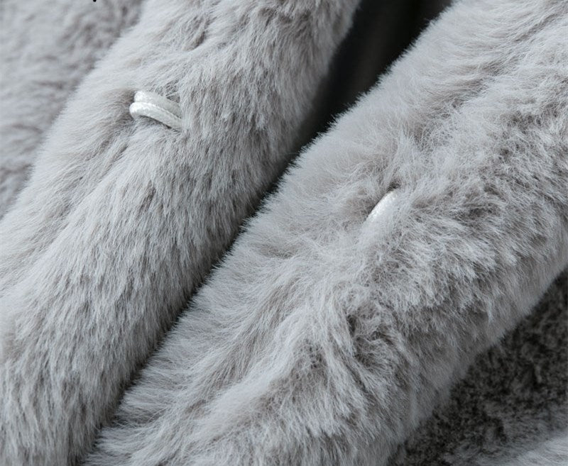 Woman wearing long faux fur coat streetwear