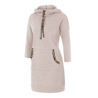 Woman wearing solid color cotton hooded sweatshirt with full hood