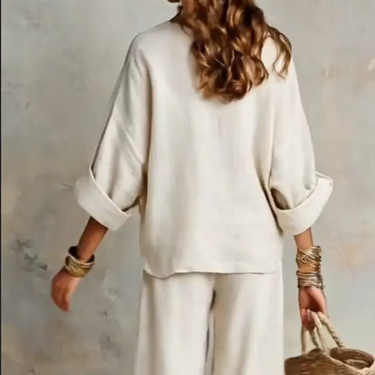 Woman wearing two piece set with wide leg pants