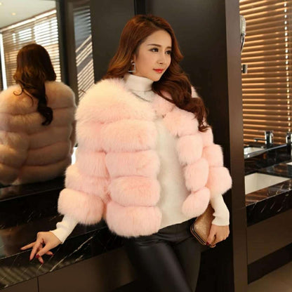 Woman wearing long faux fur winter coat outdoors