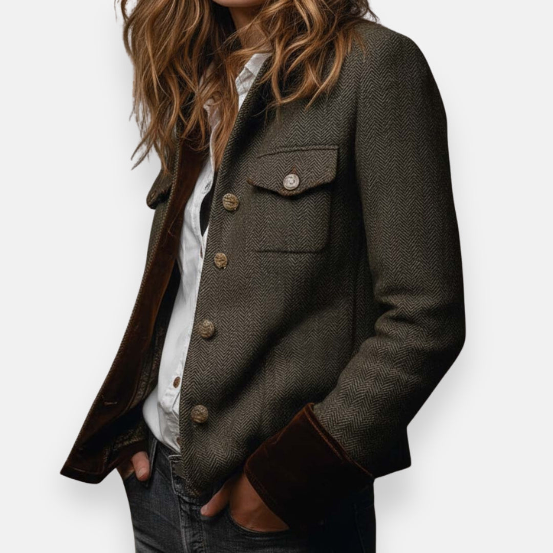 Woman wearing herringbone structured jacket with tailored fit