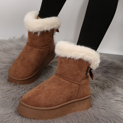 Women's black bow detail mid-top snow boots with plush lining