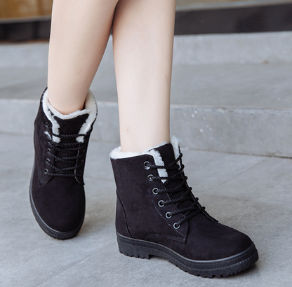 Women's flat snow boots with plush lining