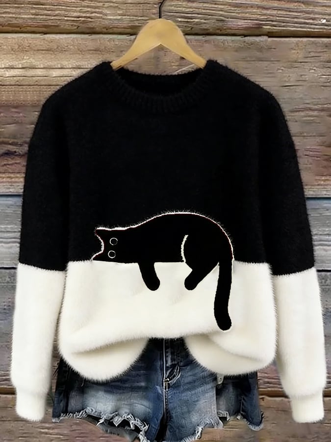 Woman wearing cat design knit sweater with long sleeves