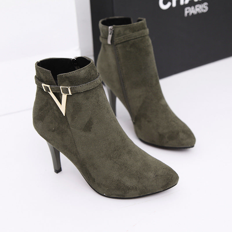 Women's high heel boots in black on white background