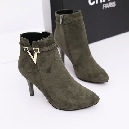 Women's high heel boots in black on white background