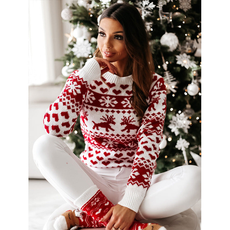 Women's red knit Christmas sweater with elk and snowflake pattern