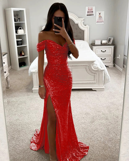 Woman in off-shoulder split party dress, solid color