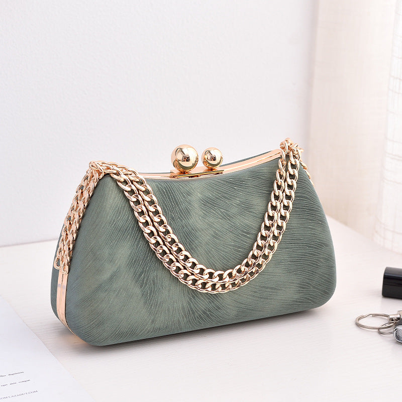 Women's chain shoulder bag with embossed pillow shape