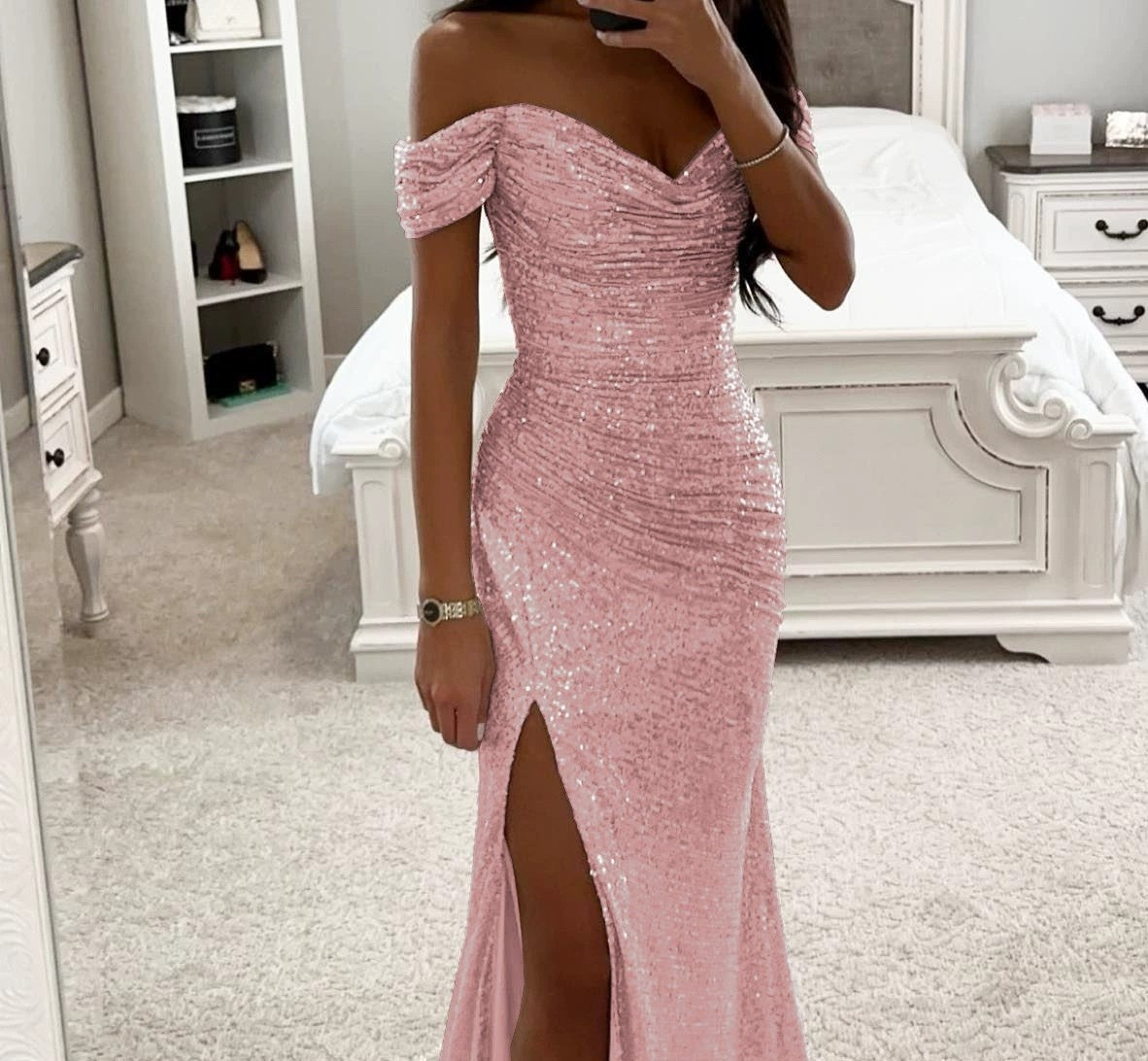Woman in off-shoulder split party dress, solid color