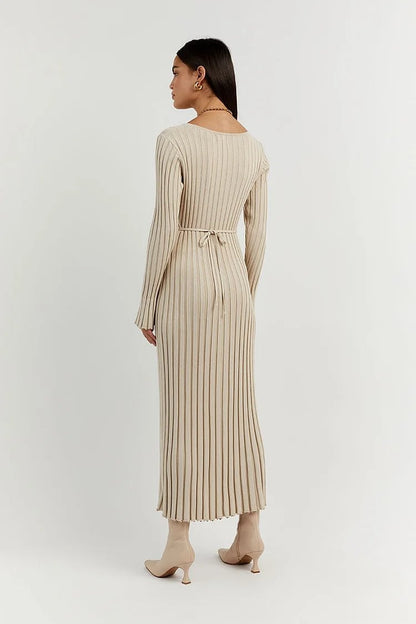 Woman wearing knit V-neck long sleeve dress