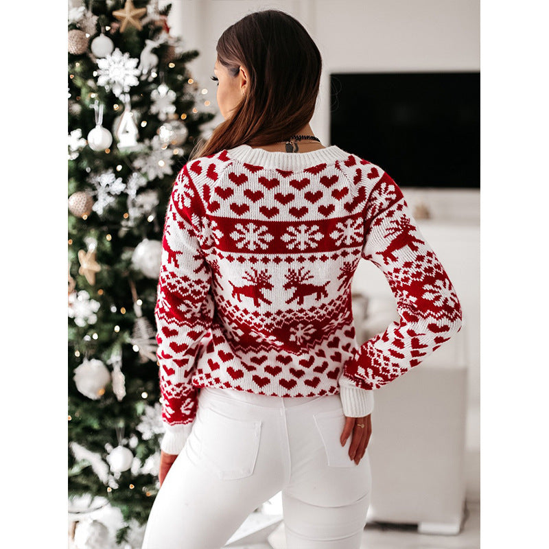 Women's red knit Christmas sweater with elk and snowflake pattern