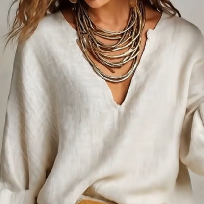 Woman wearing two piece set with wide leg pants