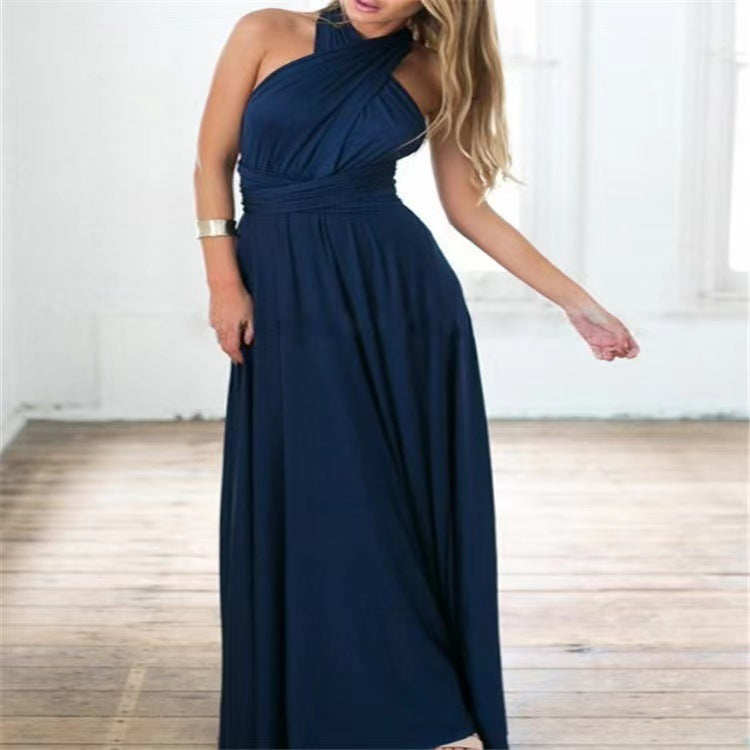 Woman wearing sleeveless V-neck long dress with cross back
