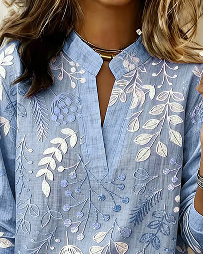 Women's draped V-neck floral blouse