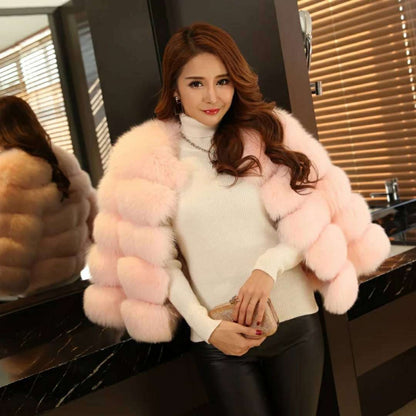 Woman wearing long faux fur winter coat outdoors