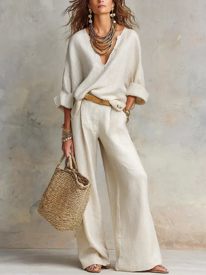 Woman wearing two piece set with wide leg pants