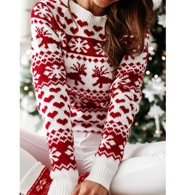 Women's red knit Christmas sweater with elk and snowflake pattern