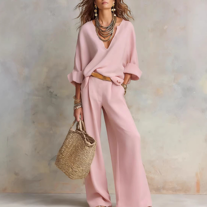 Woman wearing two piece set with wide leg pants